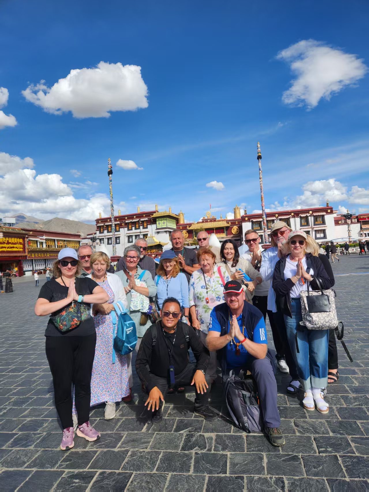 Group posing in a temple square